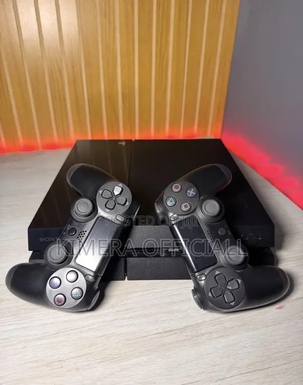 PS4 Slim with 12 Games & 2 Controllers - 1