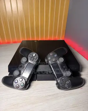 PS4 Slim with 12 Games & 2 Controllers