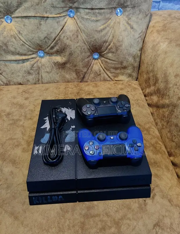 PS4 Standard with 12 Games, 2 Controllers - 1