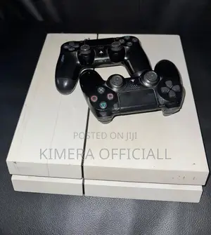 PS4 Standard (Fat) with 12 Games & 2 Controllers