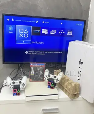 PS4 Slim Console with 12 Games and 2 Controllers