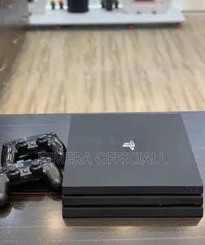PS4 Pro with 12 Games & 2 Controllers