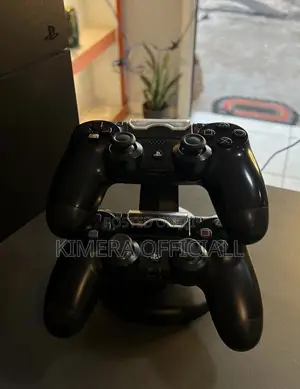 PS4 Standard Console with 12 Games & 2 Controllers