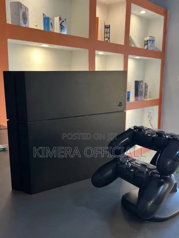 PS4 Standard Console with 12 Games & 2 Controllers - 1