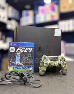 PS4 Slim Console with 12 Games & 2 Controllers