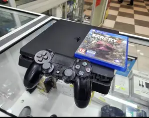 PS4 Slim Console with 12 Games and 2 Controllers