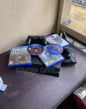 PS4 Standard Console with 12 Games & 2 Controllers