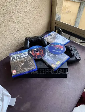 PS4 Standard Console with 12 Games & 2 Controllers