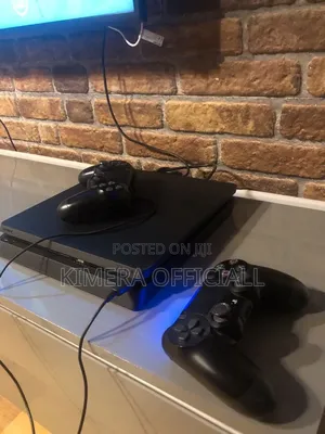 PS4 Slim 500GB with 12 Games and 2 Controllers