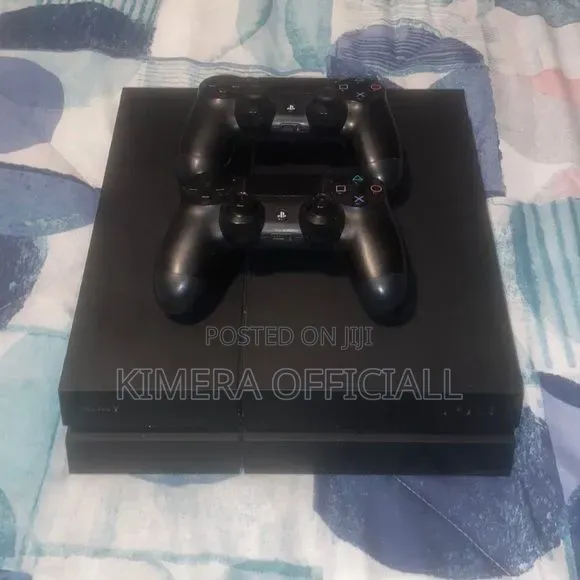 PS4 Slim Console with 12 Games and 2 Controllers - 1