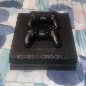 PS4 Slim Console with 12 Games and 2 Controllers
