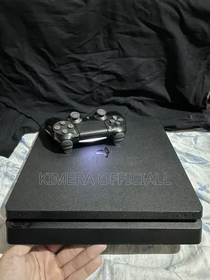 PS4 Slim Console with 12 Games and 2 Controllers
