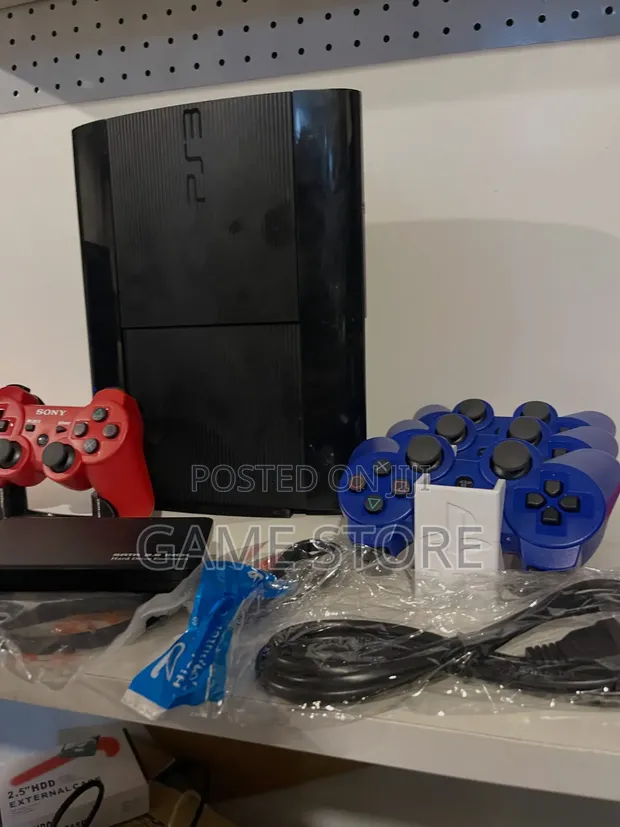 PlayStation 3 (PS3) Slim with 15 Games and 2 Controllers - 1