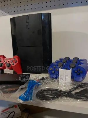 PlayStation 3 (PS3) Slim with 15 Games and 2 Controllers