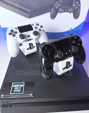 PS4 Slim Console with 12 Games & 2 Controllers