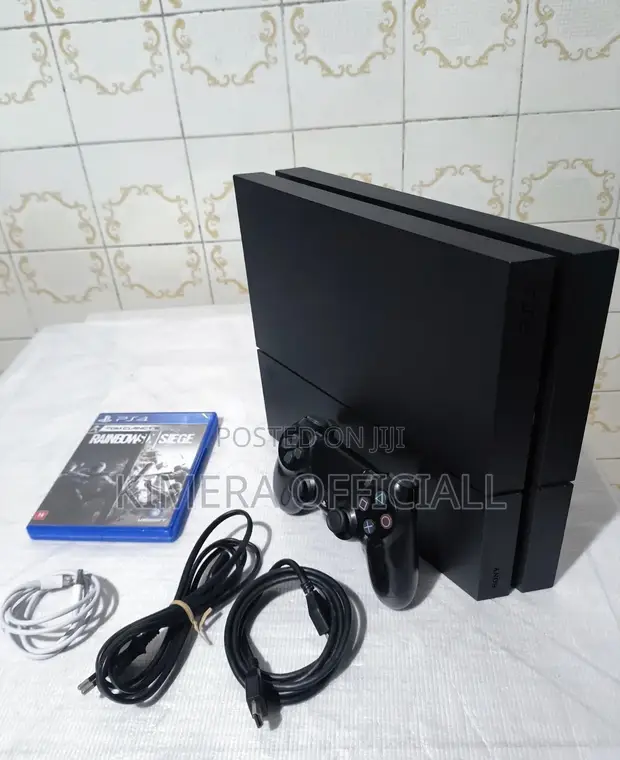 PS4 Fat Console with 12 Games & 2 Controllers - 1