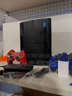 Playstation 3 Slim with 2 Controllers and 15 Games