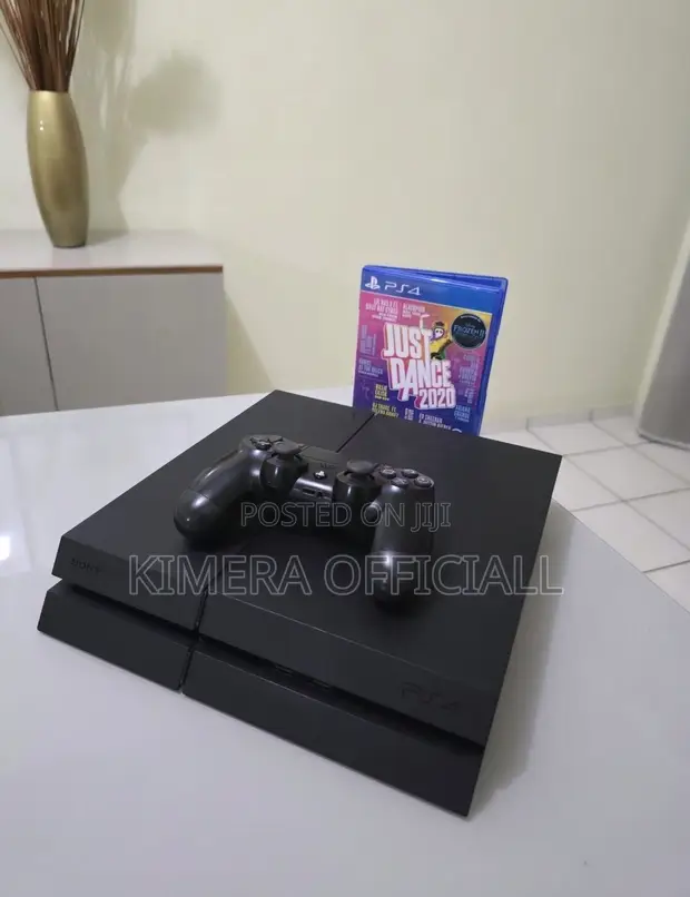PS4 Standard with 12 Games & 2 Controllers - 1