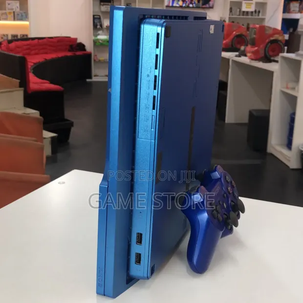 Sony PlayStation 3 Slim Bundle: 15 Games, 2 Controllers - 1