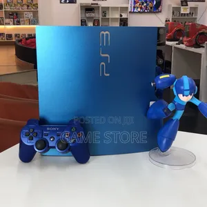 Playstation 3 Slim with 15 Games and 2 Controllers