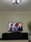 TCL 65-inch 4K UHD Android TV with 3-Year Warranty - 3