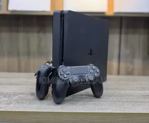 PS4 Slim Console with 12 Games & 2 Controllers