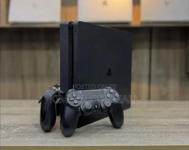 PS4 Slim Console with 12 Games & 2 Controllers - 1