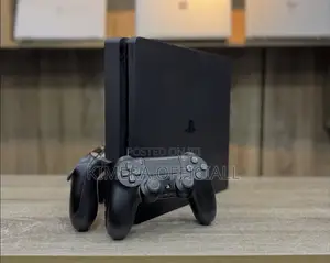 PS4 Slim Console with 12 Games & 2 Controllers