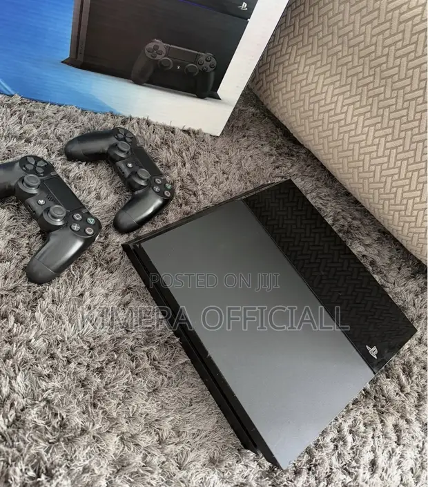 PS4 Standard Console with 12 Games & 2 Controllers - 1