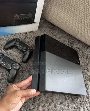 PS4 Standard Console with 12 Games & 2 Controllers