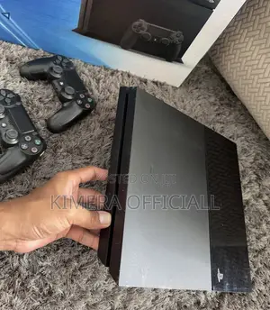 PS4 Standard Console with 12 Games & 2 Controllers