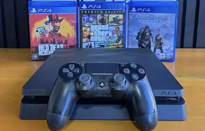 PS4 Slim with 12 Games and 2 Controllers