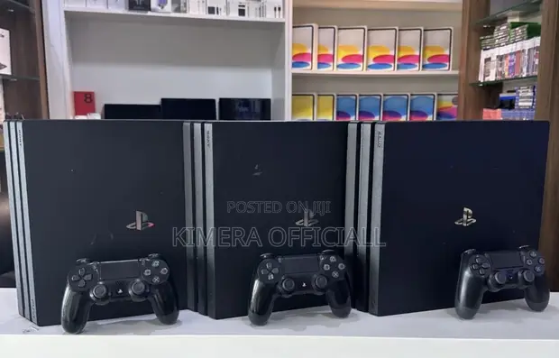 PS4 Pro with 12 Games and 2 Controllers - 1