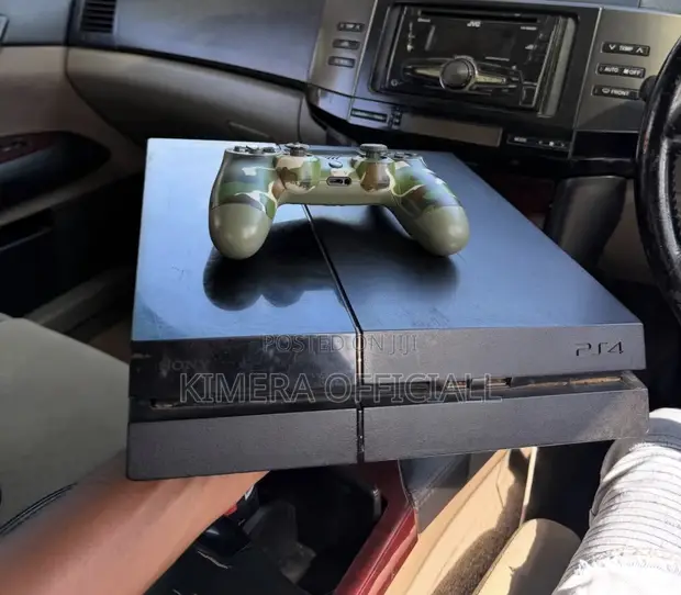 PS4 Standard Console with 12 Games & 2 Controllers - 1
