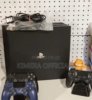 PS4 Pro with 12 Games and 2 Controllers