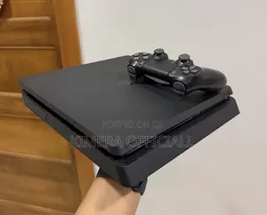 PS4 Slim Console with 12 Games & 2 Controllers