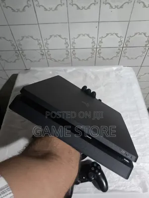 Genuine Sony PS4 Slim Console with 12 Games & 2 Controllers