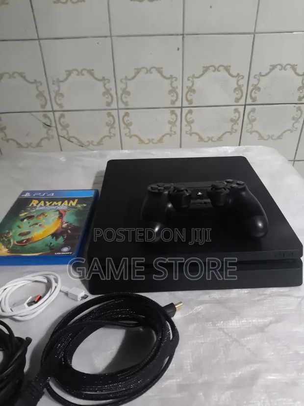 PS4 Slim Console with 2 Controllers & 13 Games - 1
