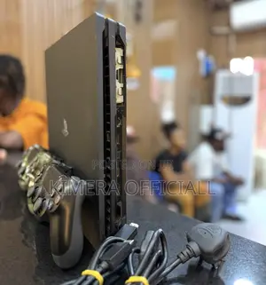 PS4 Slim Console with 12 Games & 2 Controllers