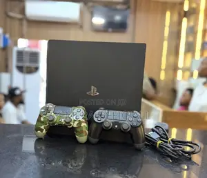 PS4 Slim Console with 12 Games & 2 Controllers