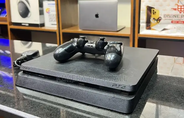 PS4 Slim Console with 12 Games & 2 Controllers - 1