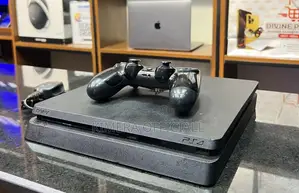 PS4 Slim Console with 12 Games & 2 Controllers