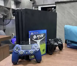 PS4 Pro with 12 Games & 2 Controllers