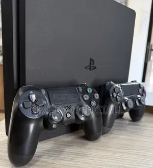 PS4 Slim Console with 12 Games & 2 Controllers