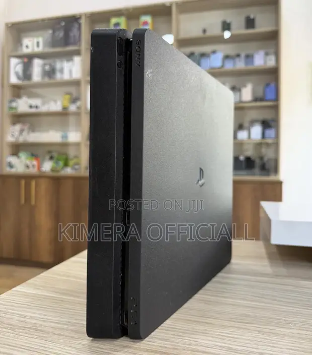 PS4 Slim Console with 12 Games & 2 Controllers - 1