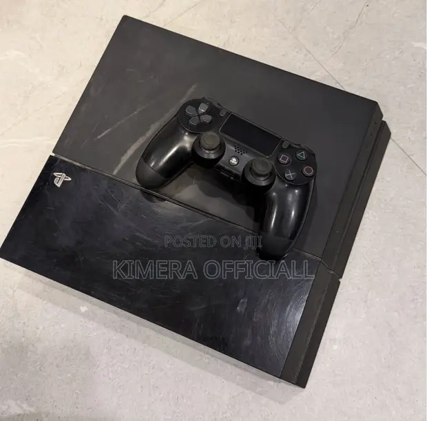 PS4 Standard with 12 Games & 2 Controllers - 1
