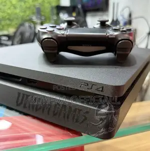 PS4 Slim with 12 Games & 2 Controllers