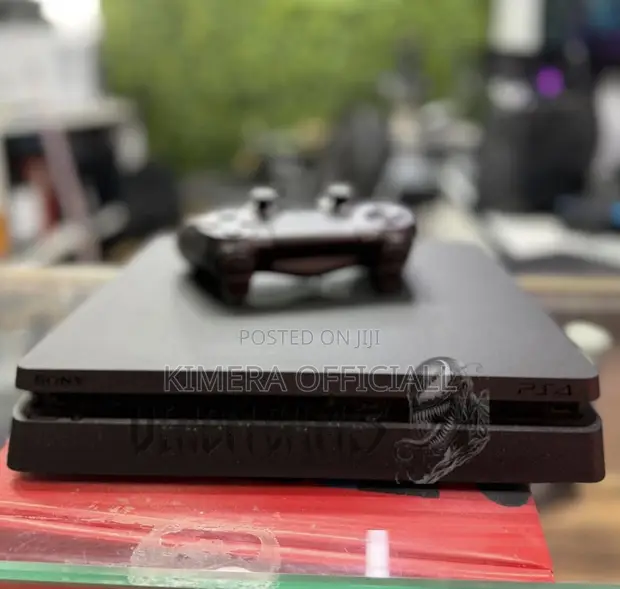 PS4 Slim Console with 12 Games & 2 Controllers - 1