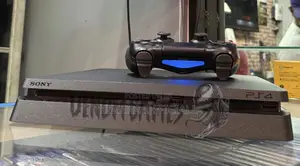 PS4 Slim Console with 12 Games & 2 Controllers