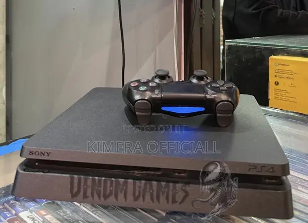 PS4 Slim Console with 12 Games & 2 Controllers - 1